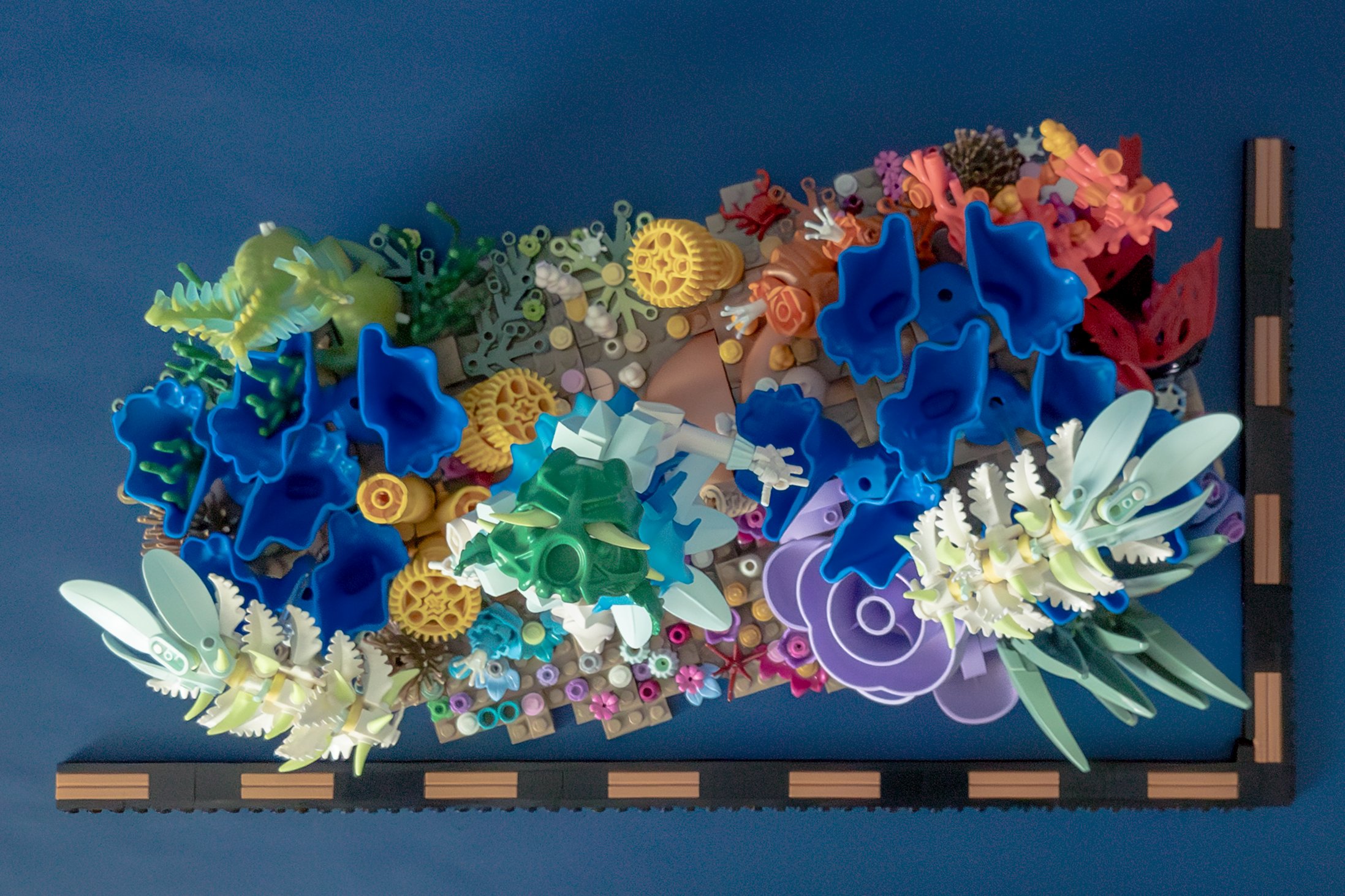 Scene viewed from above, with an L-shaped ruler that indicates the dimensions as around 52 by 28 studs