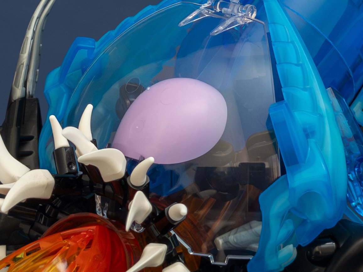 Large clear canopy element showing reflections of a room and camera